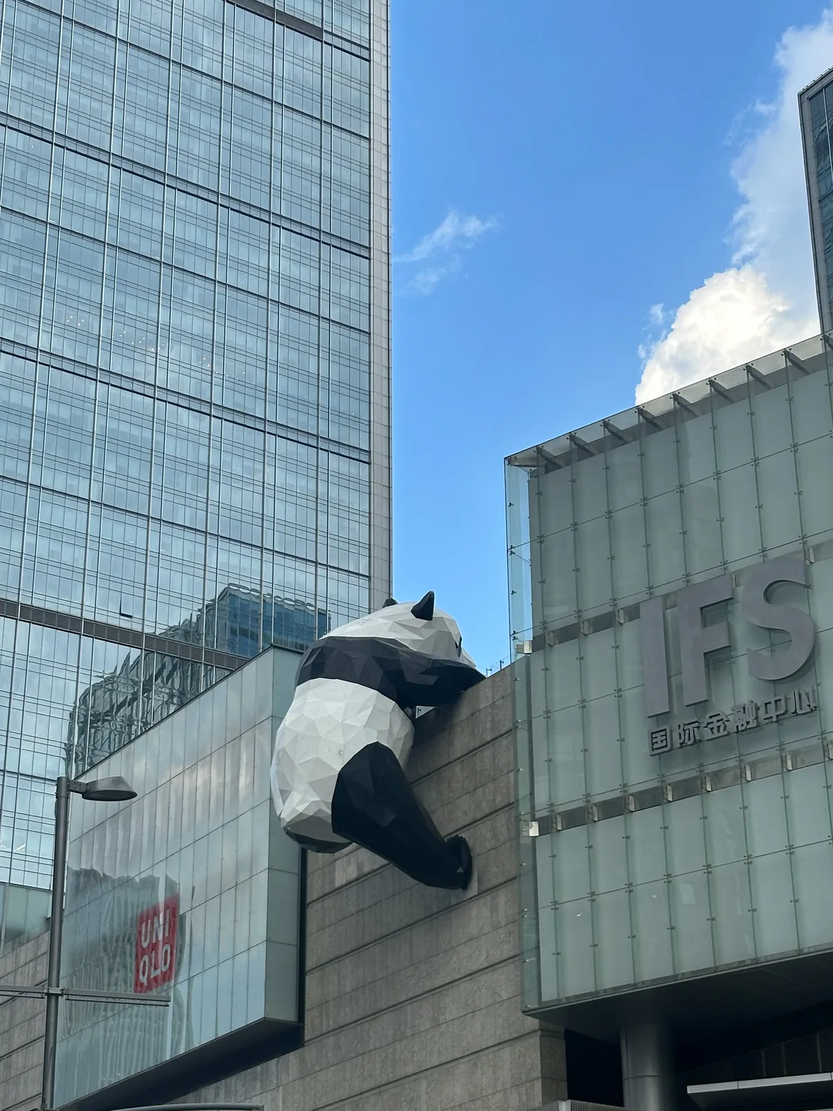 IFS shopping mall building with its landmark climbing panda sculpture