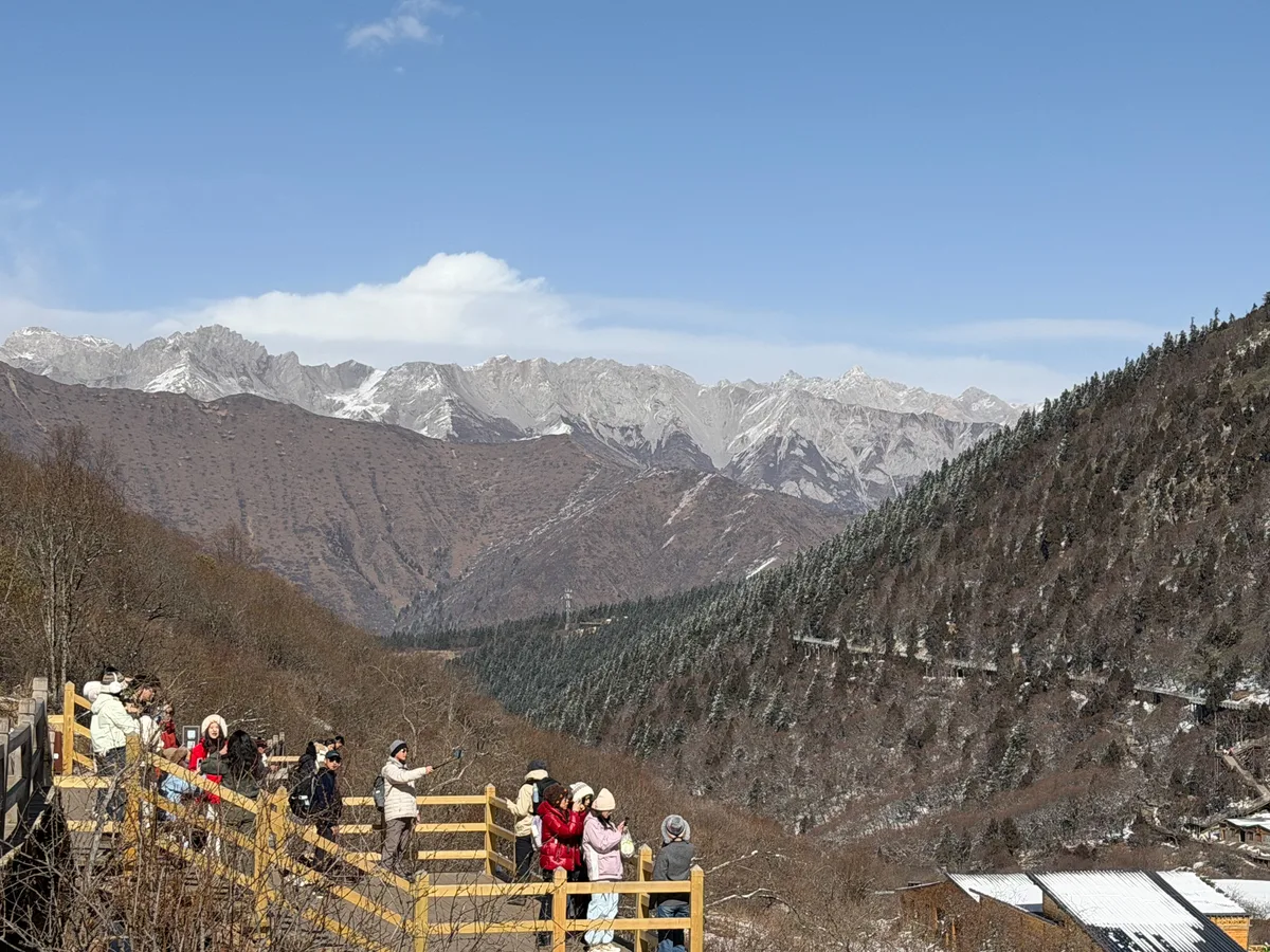 Viewpoint near Wuchi Pond overlooking snow-capped mountains at Huanglong