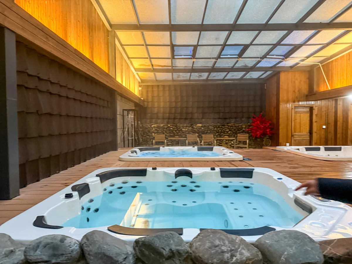 Hot spring soaking tubs at Jiuzhaigou Regent Retreat Hotel