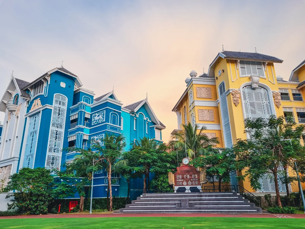 Colorful department-themed buildings and a clock tower monument at JW Marriott Phu Quoc