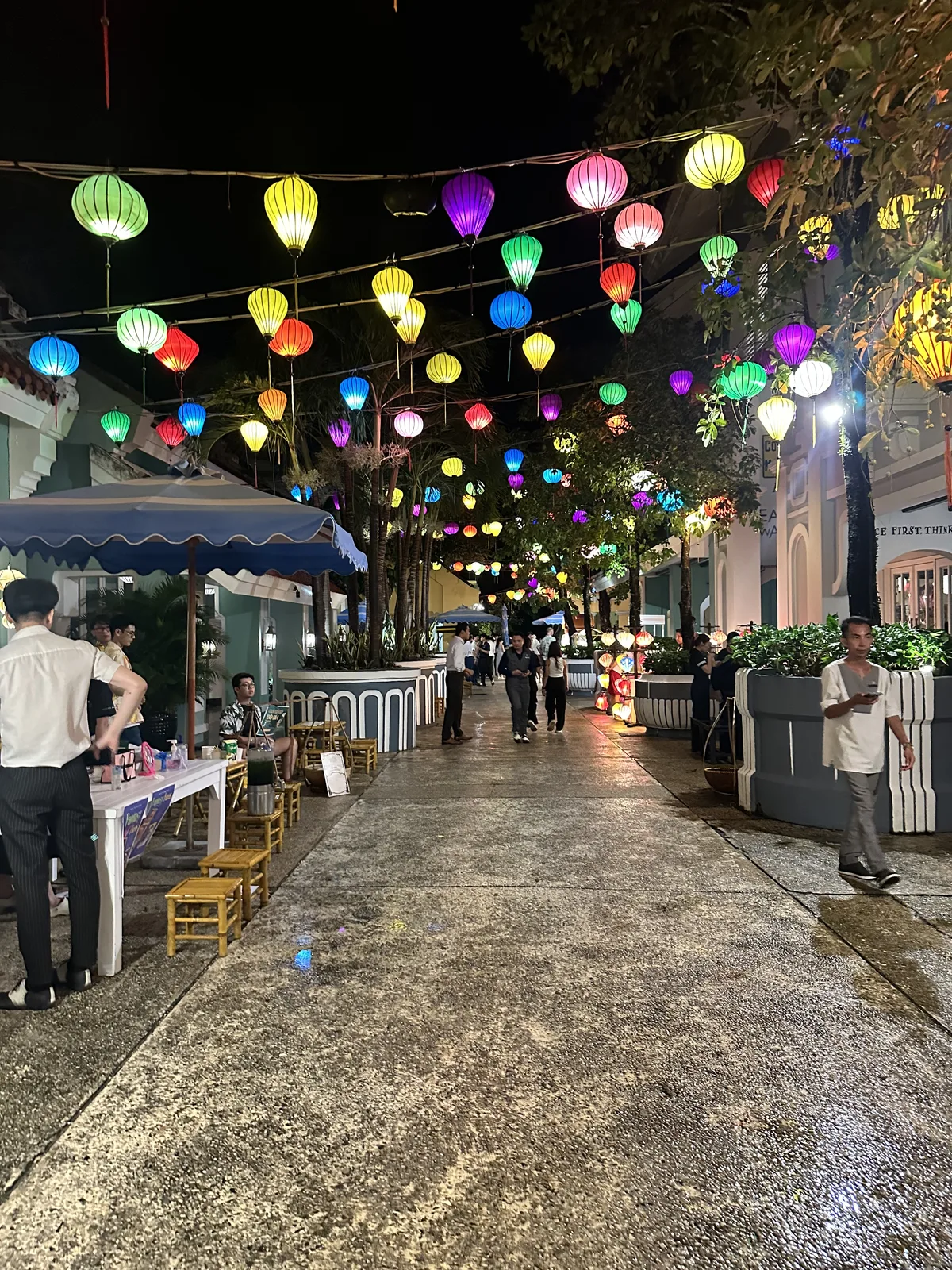 Colorful paper lanterns strung along the Lamarck Night Market walkway at JW Marriott Phu Quoc
