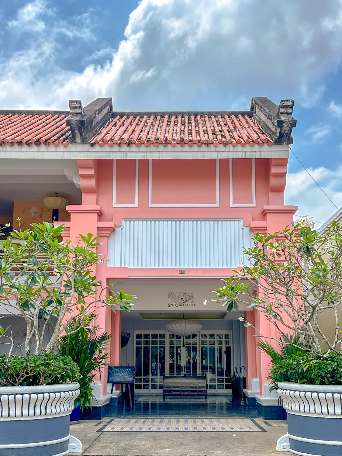 Pink colonial-style exterior of Spa Chanterelle by JW at JW Marriott Phu Quoc
