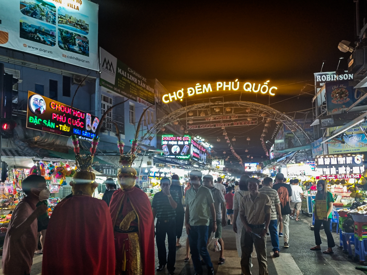 Illuminated entrance arch of the Phu Quoc Night Market in Duong Dong at night