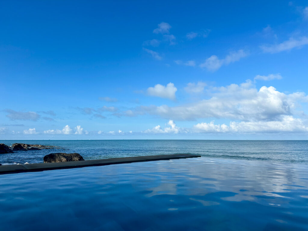 Infinity pool blending into the ocean at a quiet Ong Lang resort in Phu Quoc