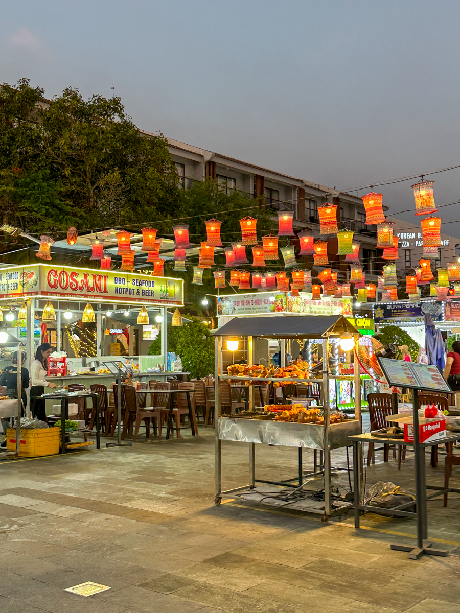 Seafood BBQ stalls and red lanterns at the Sonasea night market in Phu Quoc