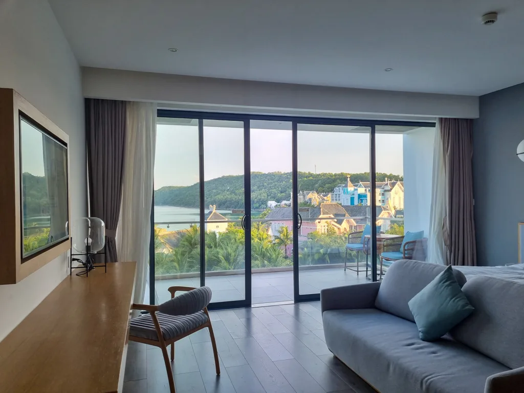 Penthouse living room with ocean view balcony at Premier Residences Phu Quoc Emerald Bay
