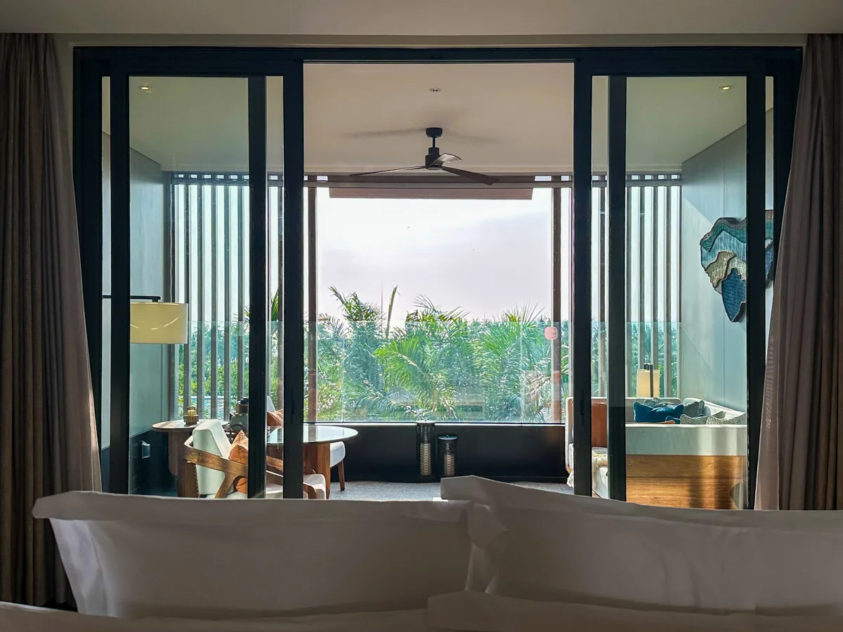 View from the bed into the living area of an Ocean View Suite at Regent Phu Quoc