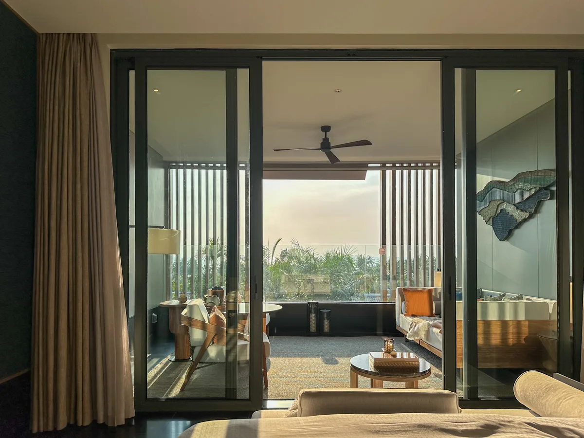 Living area of an Ocean View Suite at Regent Phu Quoc at dusk