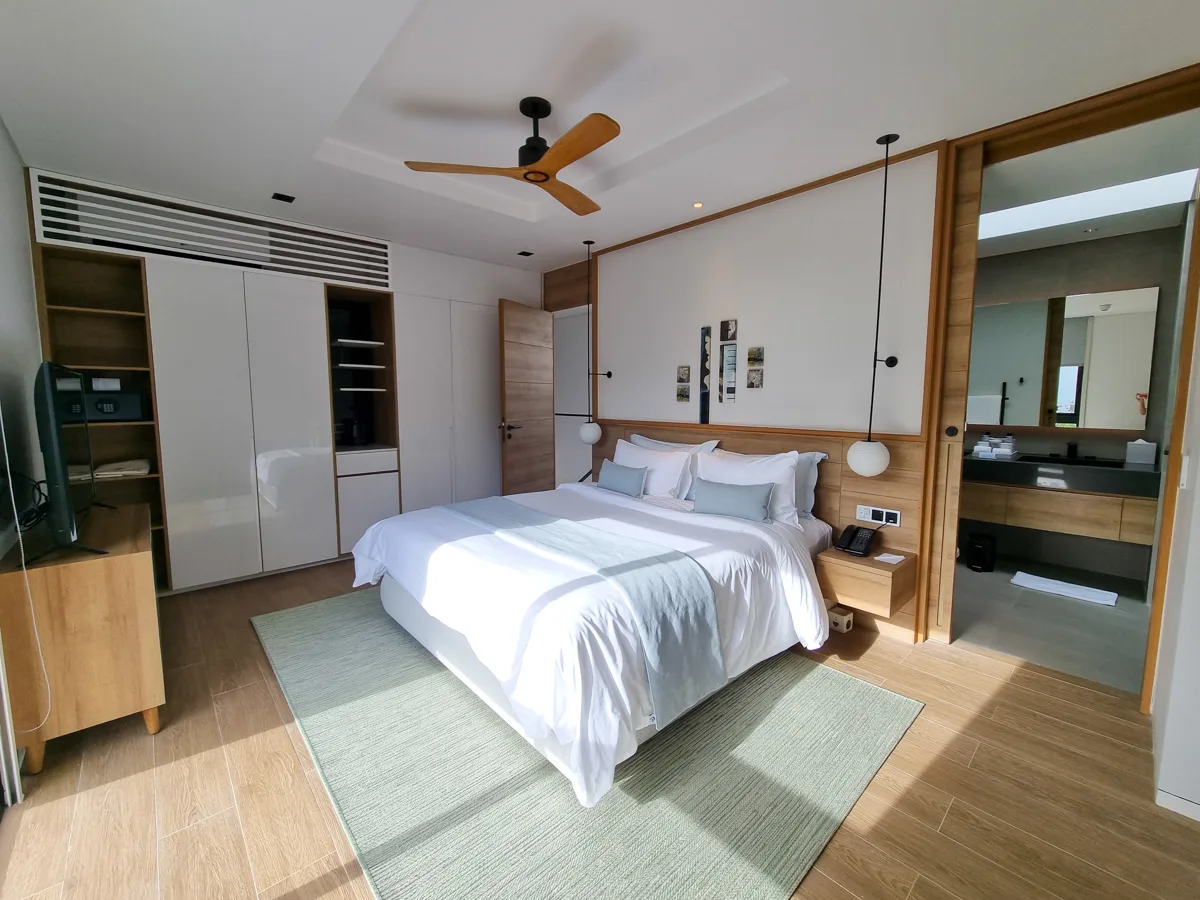 Modern villa bedroom with ensuite bathroom at Sailing Club Signature Resort Phu Quoc