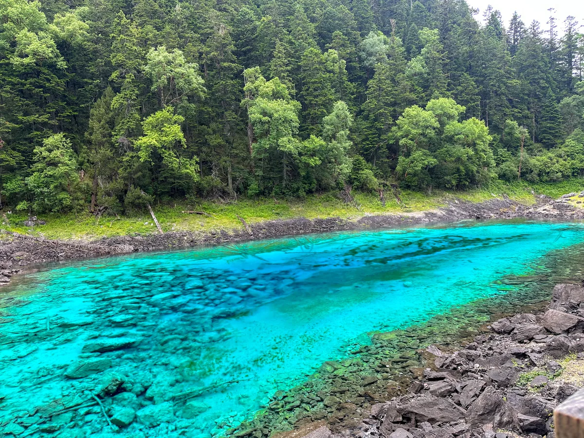 Five-Colored Pond (Wucaichi) with its multicolored water