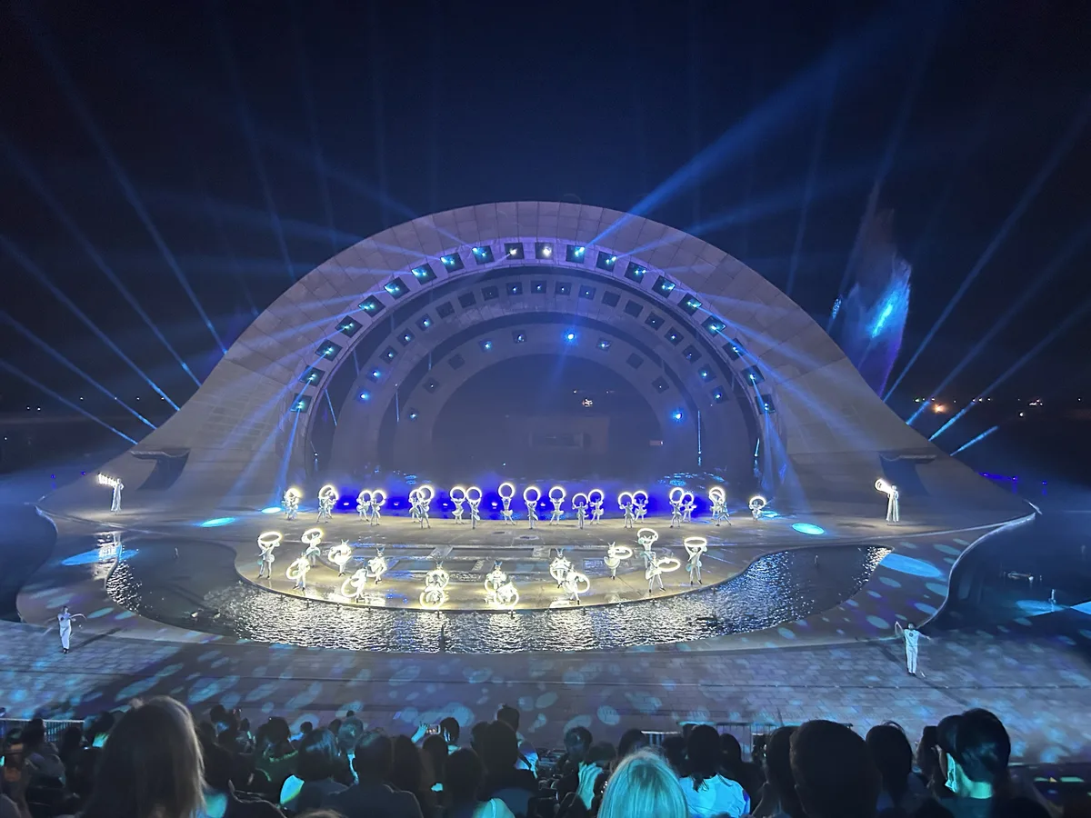 The Kiss of the Sea show mid-performance with laser lights in Phu Quoc